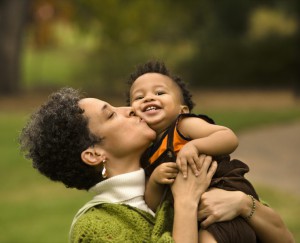 724213-woman-kissing-boy